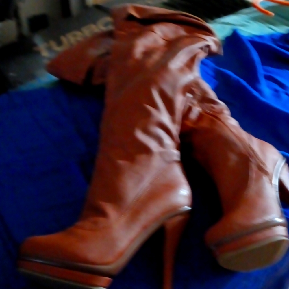Women's boots by Charlotte Russe, size 6..5 tan color